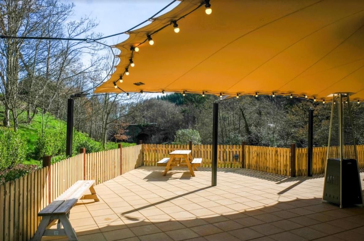 Woodenbridge Hotel Esterno foto
