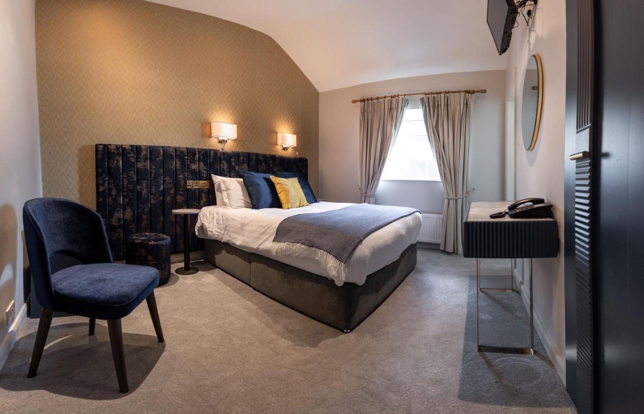 Woodenbridge Hotel Esterno foto