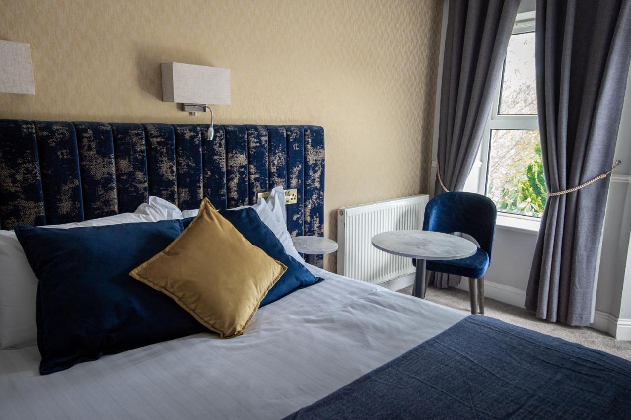 Woodenbridge Hotel Esterno foto