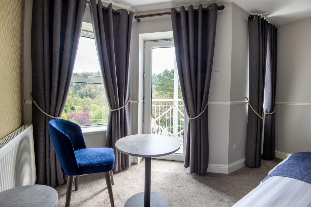 Woodenbridge Hotel Esterno foto